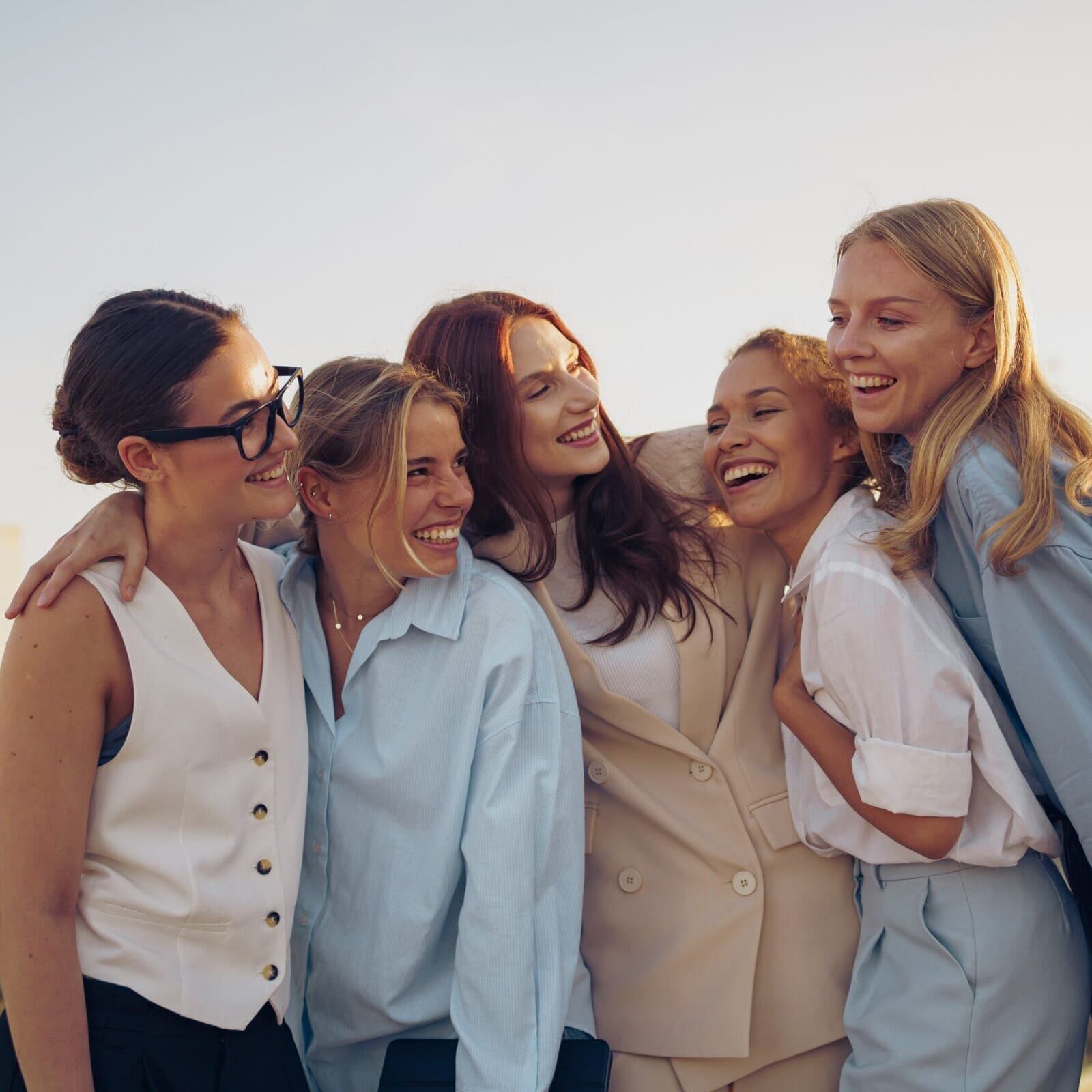 Group of women laughing together outdoors