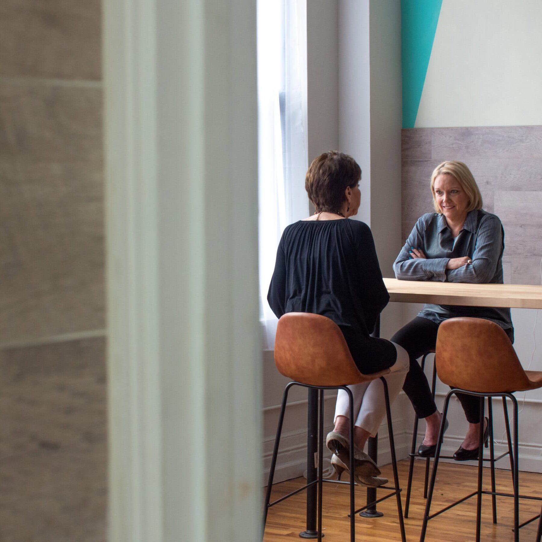 Client engaging in a coaching session focused on leadership and growth.