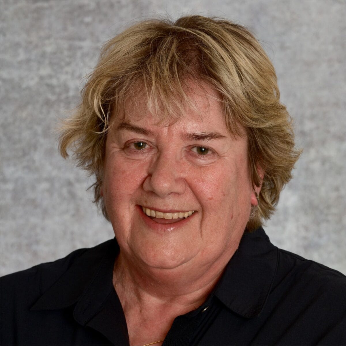 Headshot of Kath Milne, MCC with the International Coaching Federation. Known for creating opportunities that bring out the best in individuals and organizations.