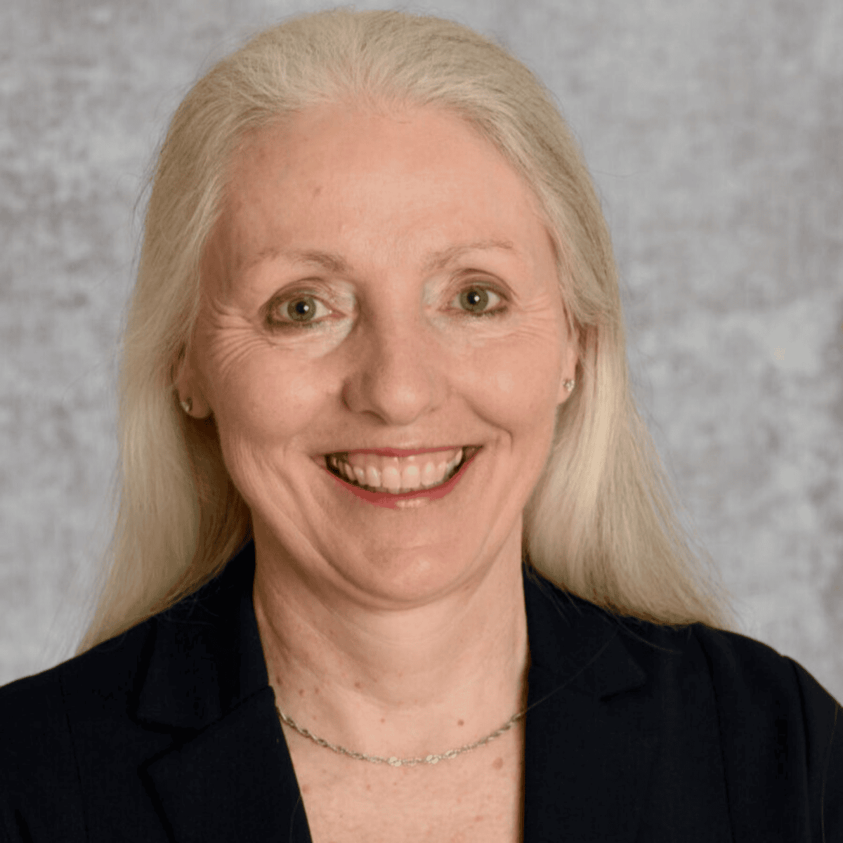 Headshot of Anne Schweppenhäußer, MCC with the International Coaching Federation. Dedicated to shaping a better world through coaching, team training, and ethical leadership.